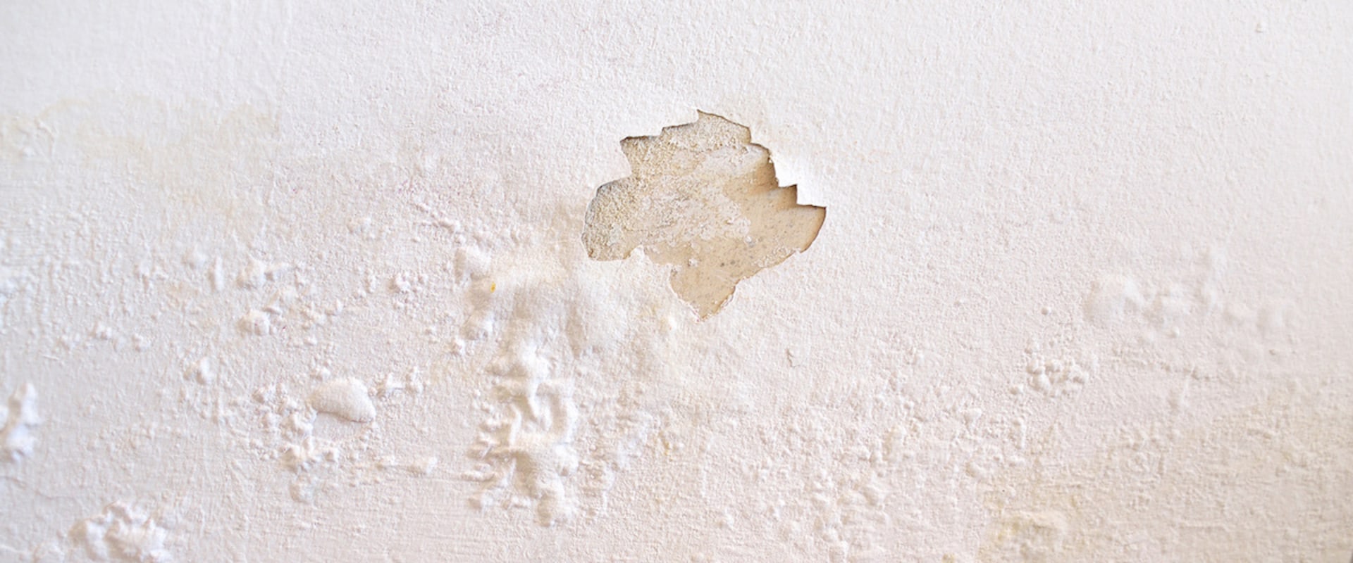 How do you remove water damage from drywall?